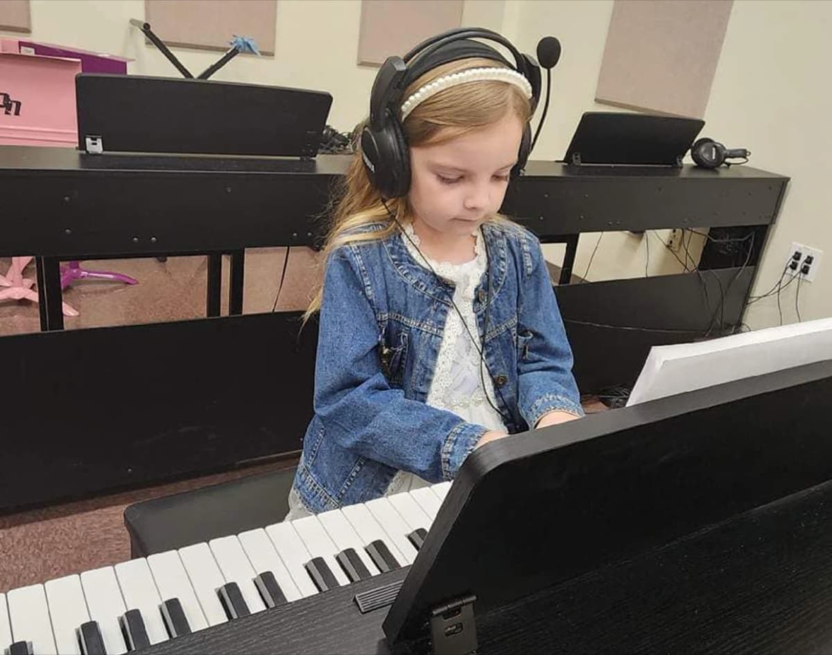 Student playing the piano