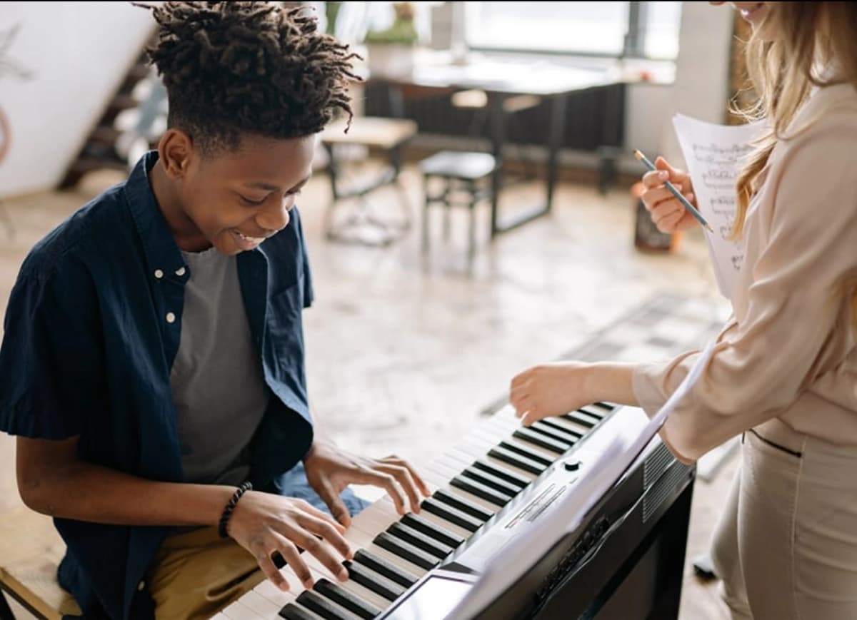 Student playing the piano