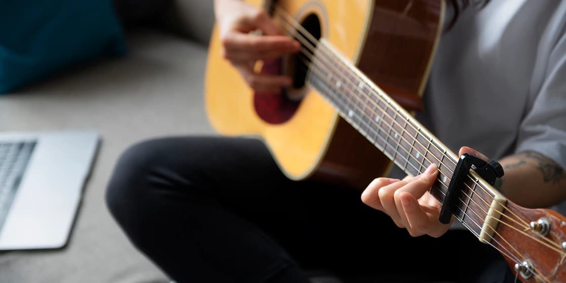Cover Image for Guitar Lessons Near Me: Acoustic vs. Electric for Beginners (and Setup Checklist)