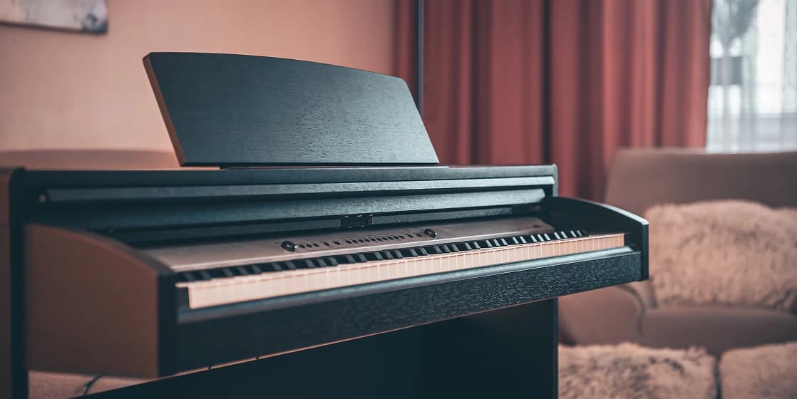 Cover Image for Keyboard vs. Acoustic Piano for Beginners: Technique, Noise, and Budget (Florida Homes)